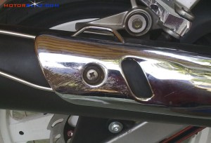 memperbaiki knalpot krom rusak